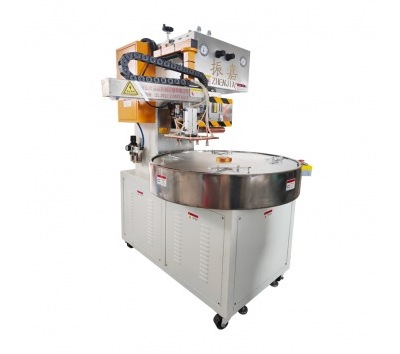 自動(dòng)熔斷高周波機(jī)壓紀(jì)念幣包裝